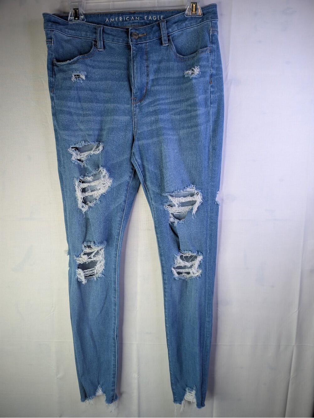American Eagle Hi-Rise‎ Jegging Light Wash Distressed Jeans Size 8 Regular